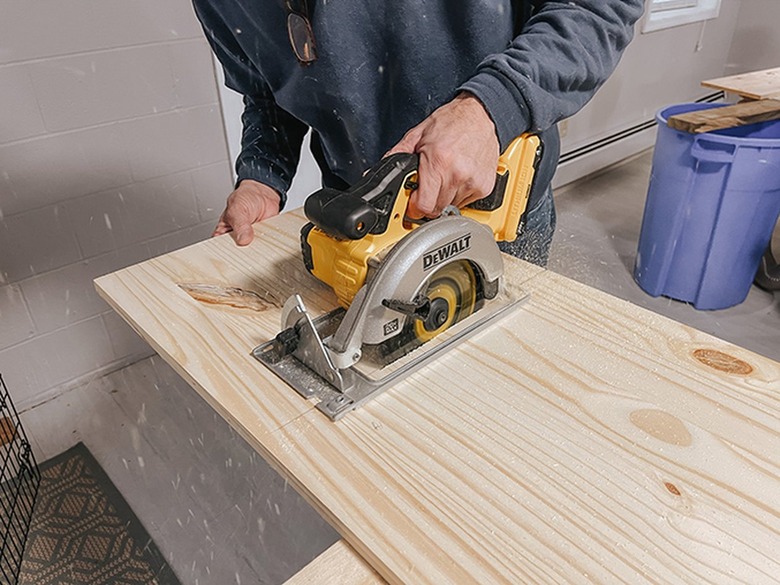 Cut the wood down along your marked lines.