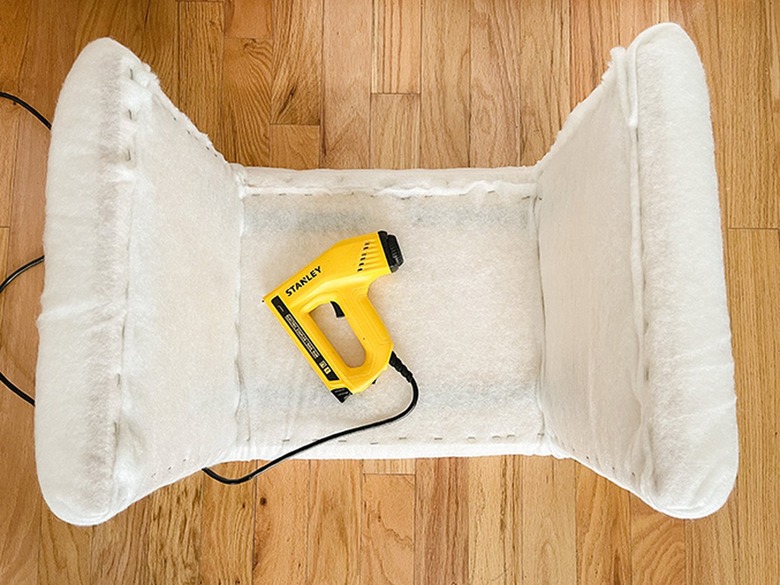 Wrap the entire stool form with batting.