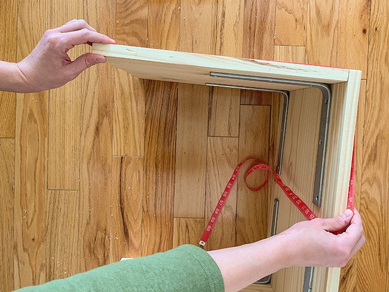 Measure the outside planes of the stool form.