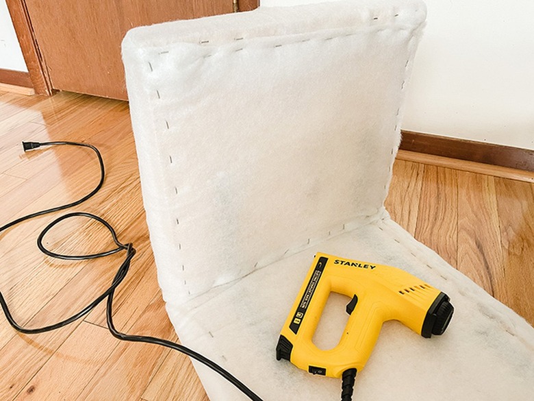 Cut off the excess batting with scissors.