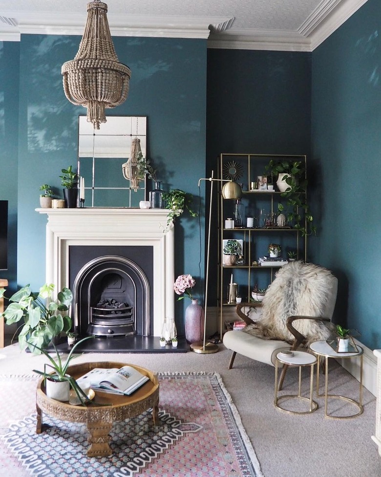 living room with teal walls