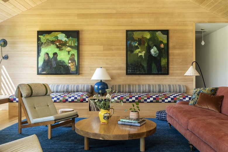 living room with wood paneled walls