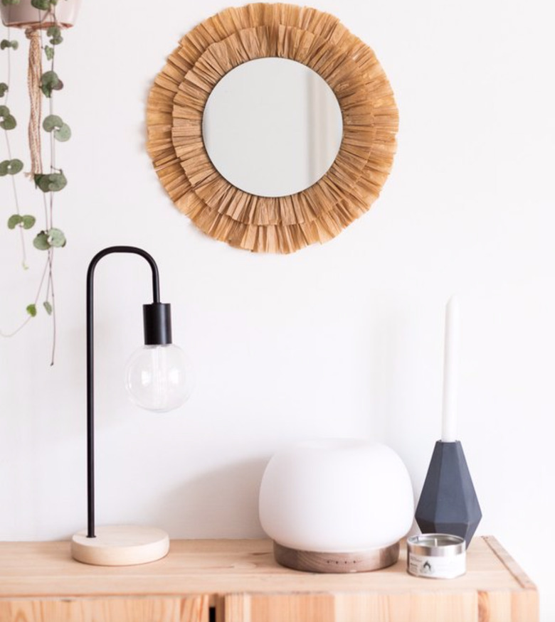 Turn a simple mirror into something special with this raffia trim.