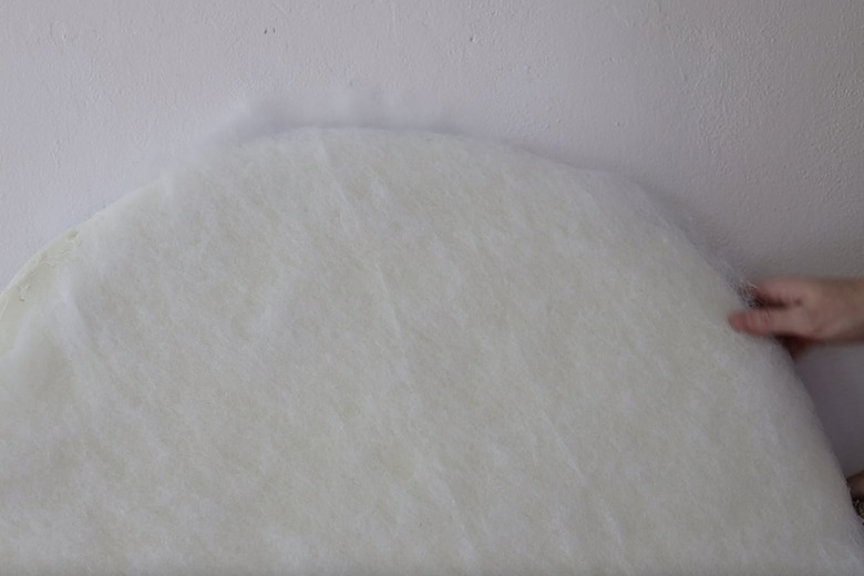 Covering foam on headboard with batting