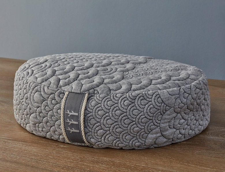 circular gray meditation and yoga pillow