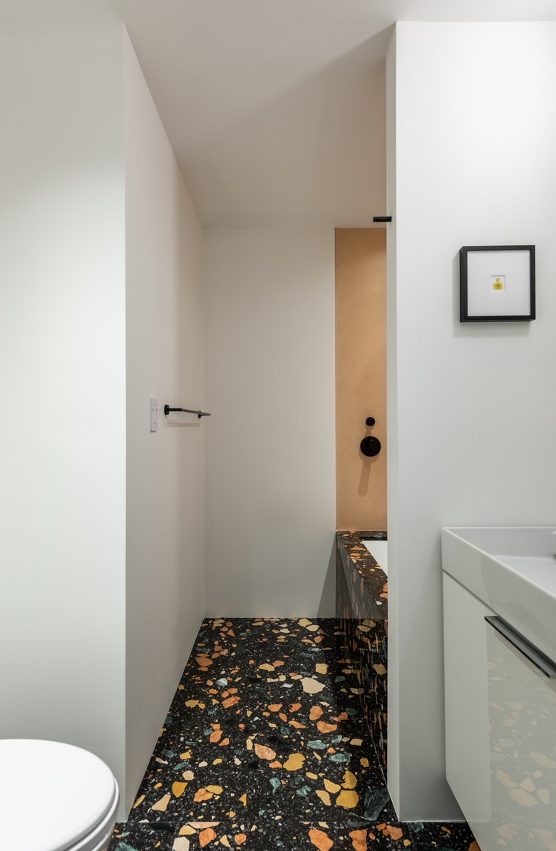 small bathroom with dzek floor