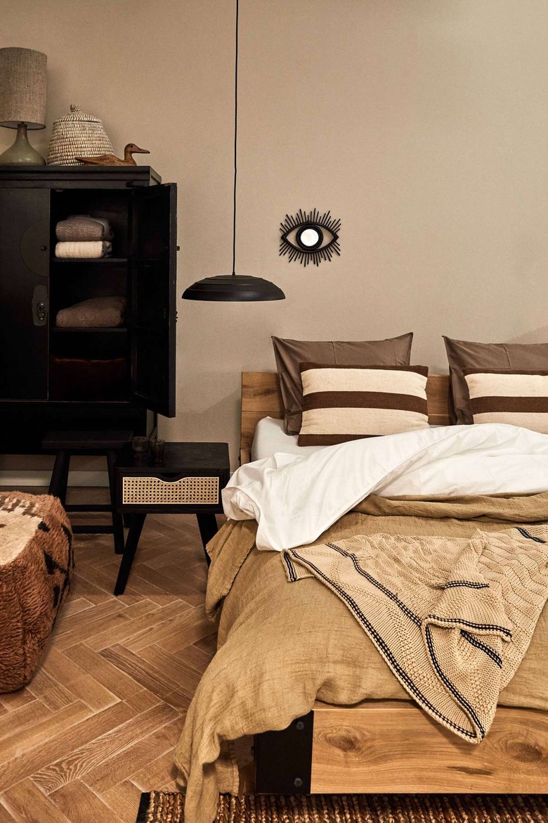 Tan walls with wooden flooring.