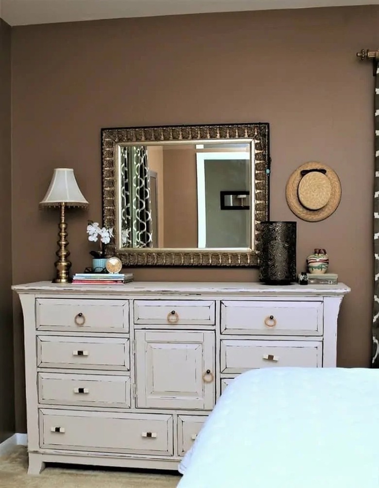 Light brown room with rustic dresser