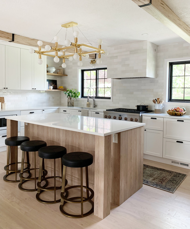 kitchen with modern chandelier installed above the kitchen island