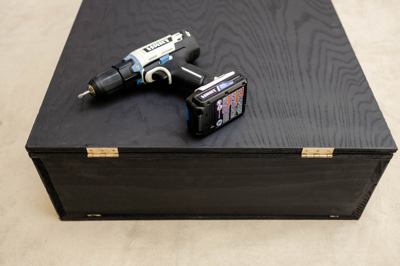 Attaching hinges to plywood sheet with HART drill