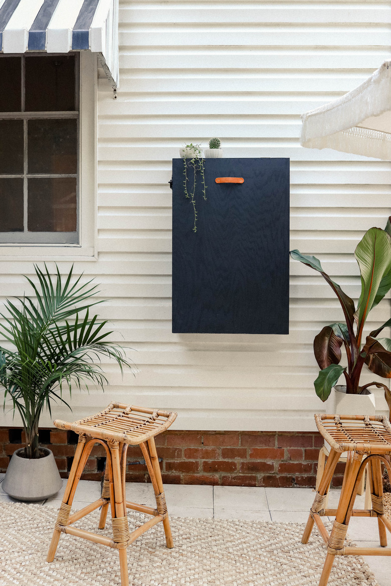 Murphy bar in closed position against the wall in patio