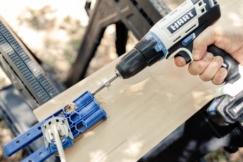 Drilling into board with a Kreg pocket hole jig