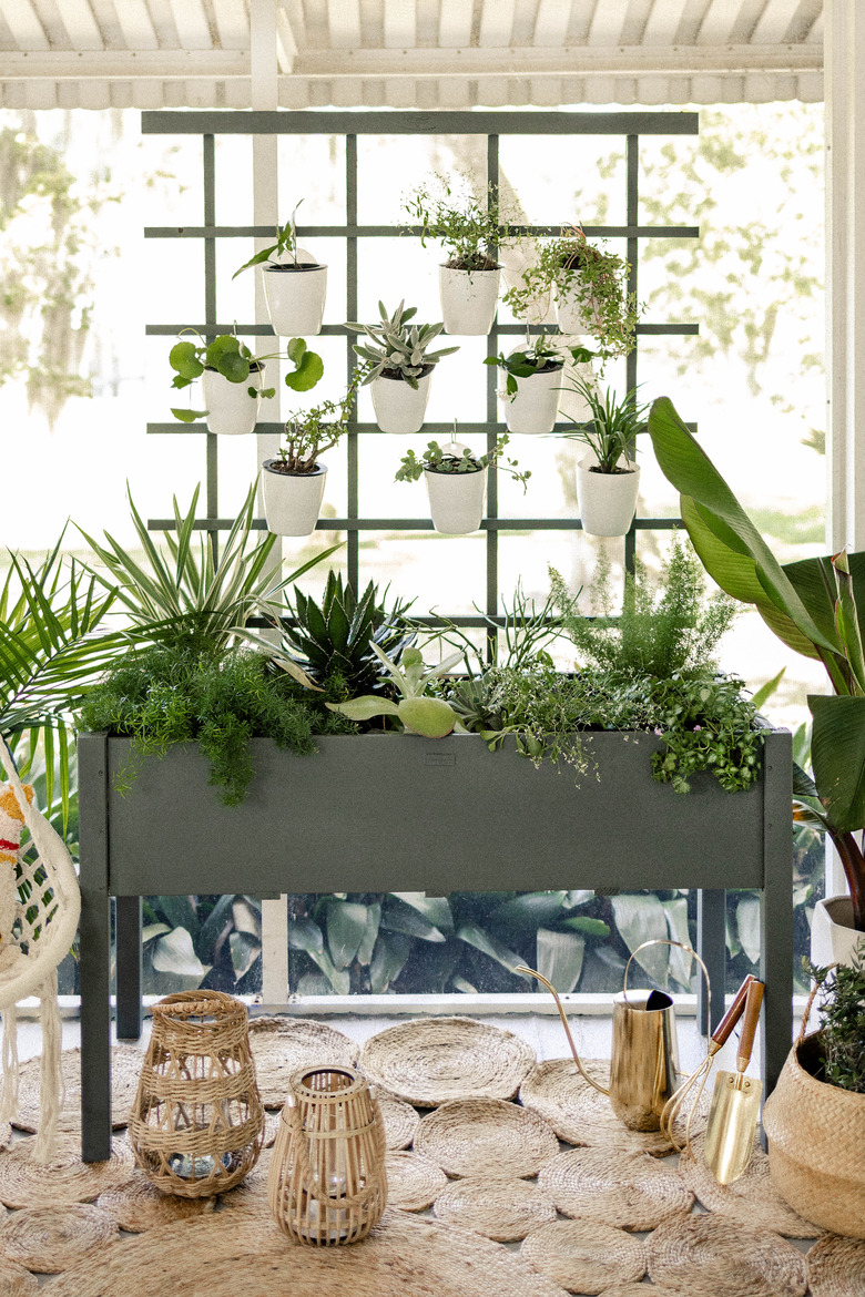 DIY vertical garden on boho patio with hammock