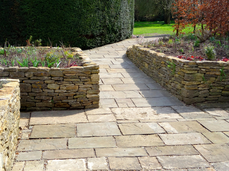 Image of raised garden beds with flagstone paving patio