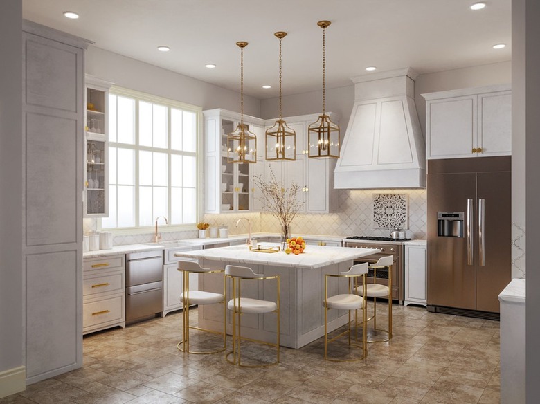 Kitchen with light gray walls and white cabinets