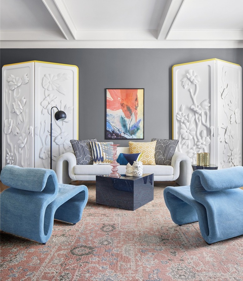 room with gray walls and pink patterned carpet tiles