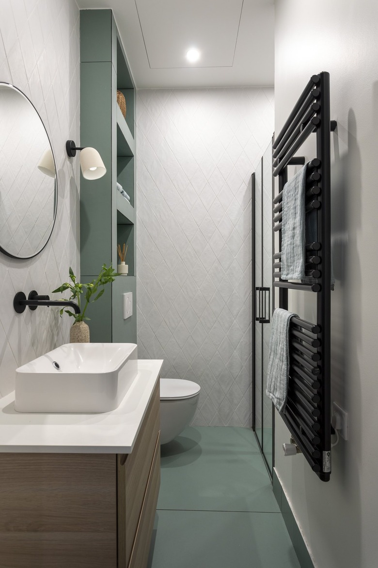 The parents' bathroom has a soothing green hue.