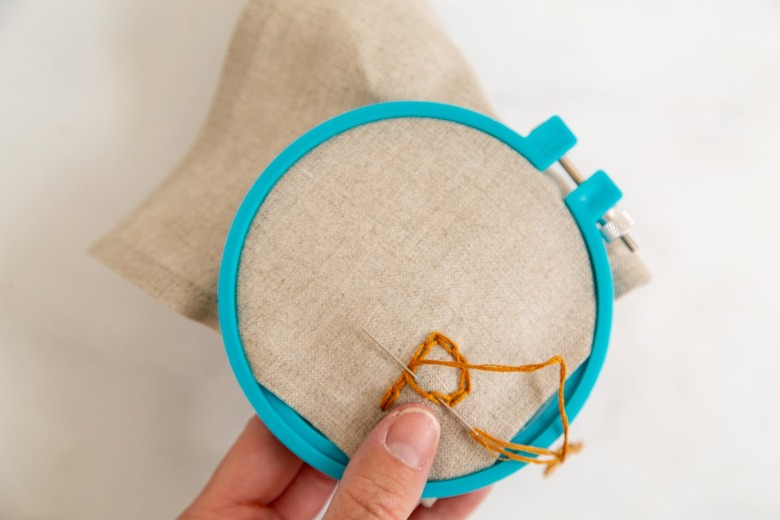 Chain stitch tutorial on linen napkin