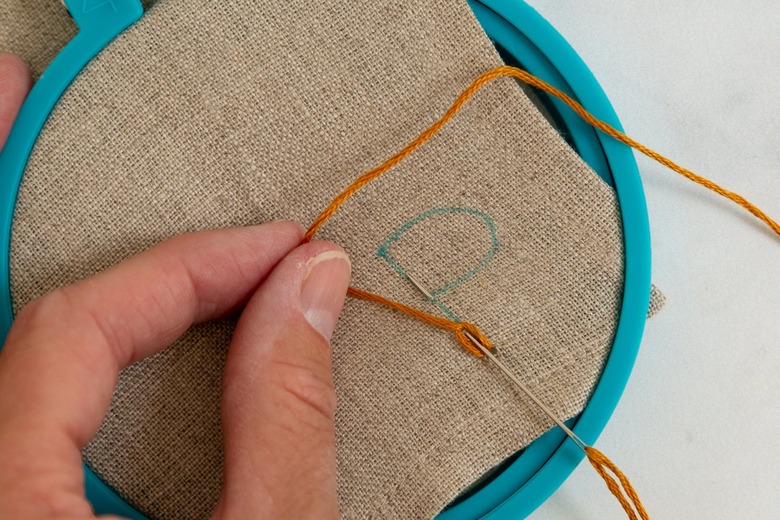 Chain stitch tutorial on linen napkin