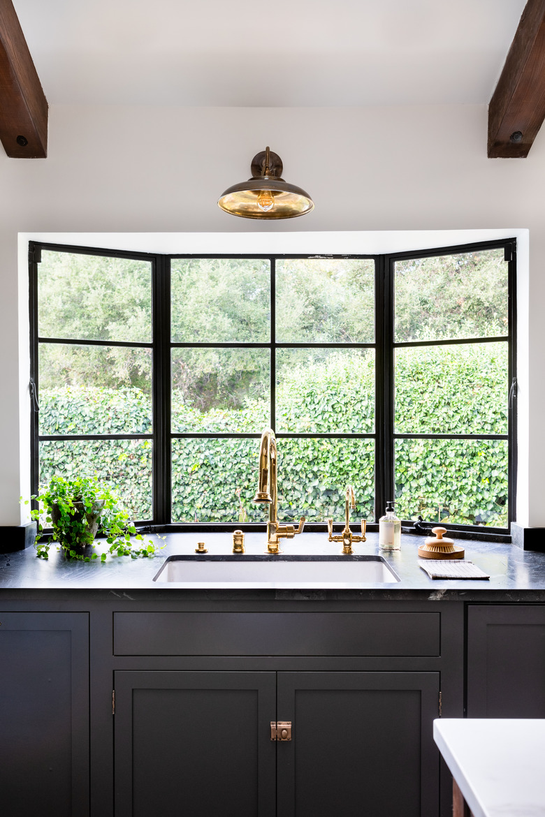 white kitchen with charcoal color cabinets