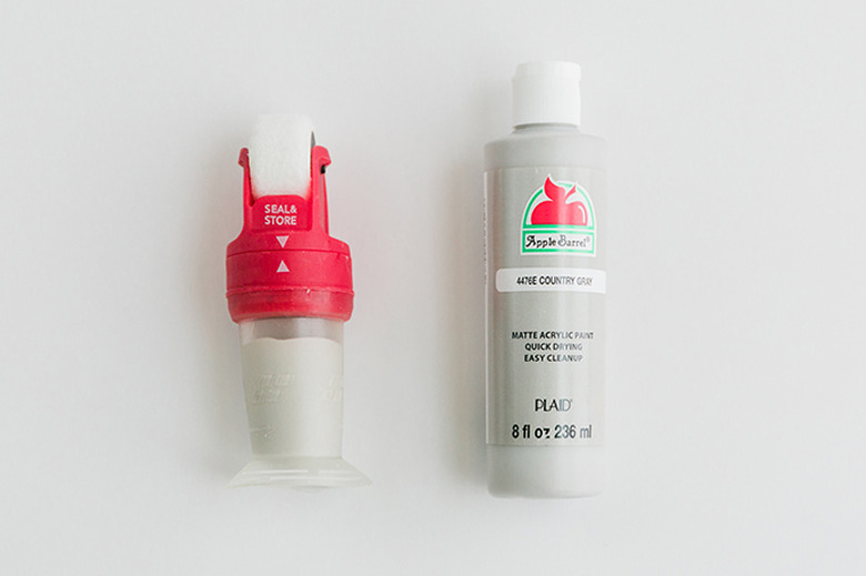 Fill the roller with acrylic paint.