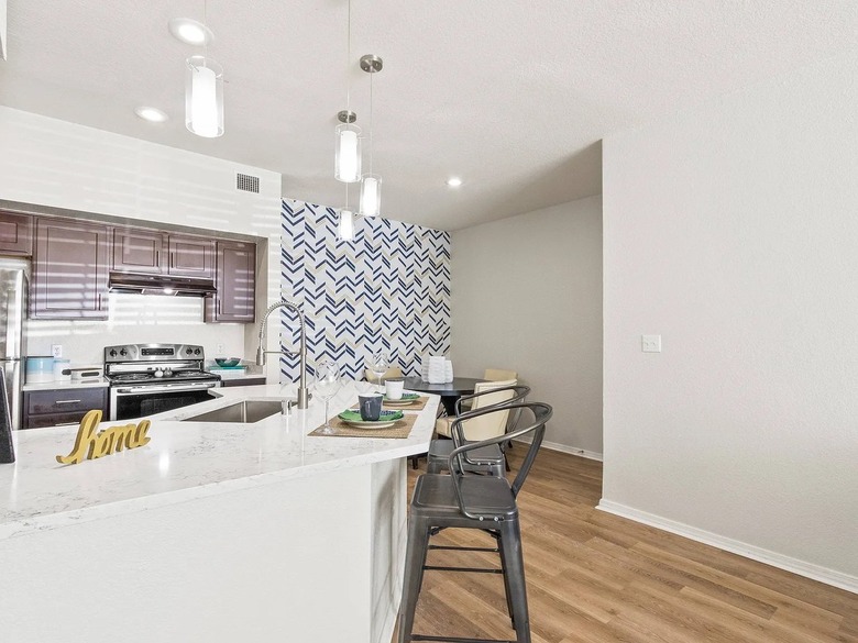White kitchen with stools