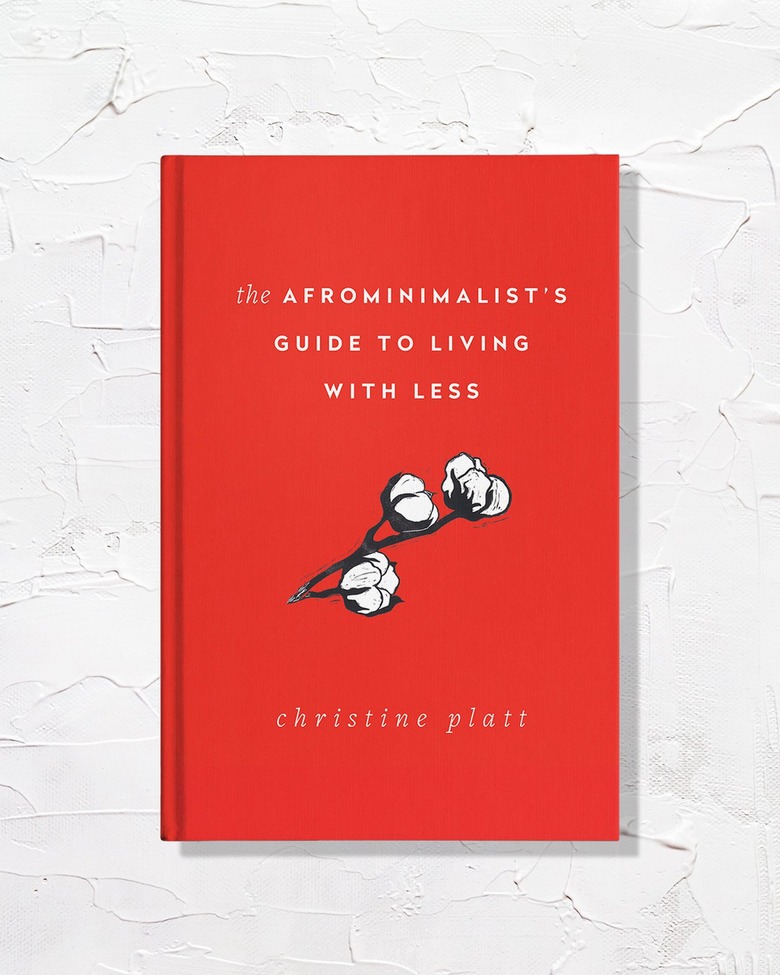 red book with title The Afrominimalist's Guide to Living With Less