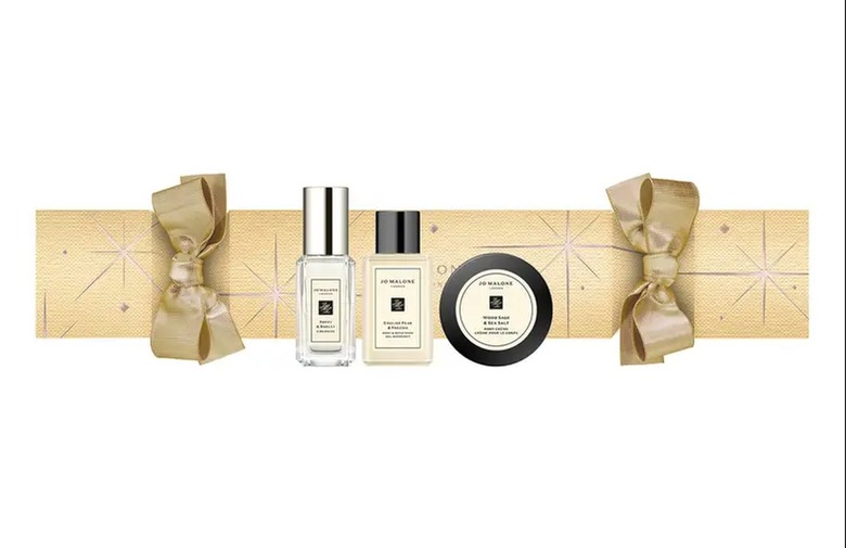 gold christmas cracker with three body products