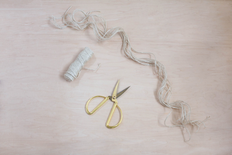 Cutting long strands of twine