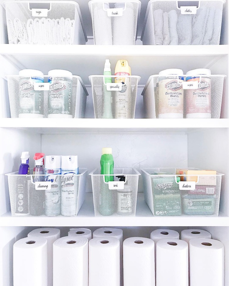 Cleaning Closet storage idea full of supplies in wire baskets