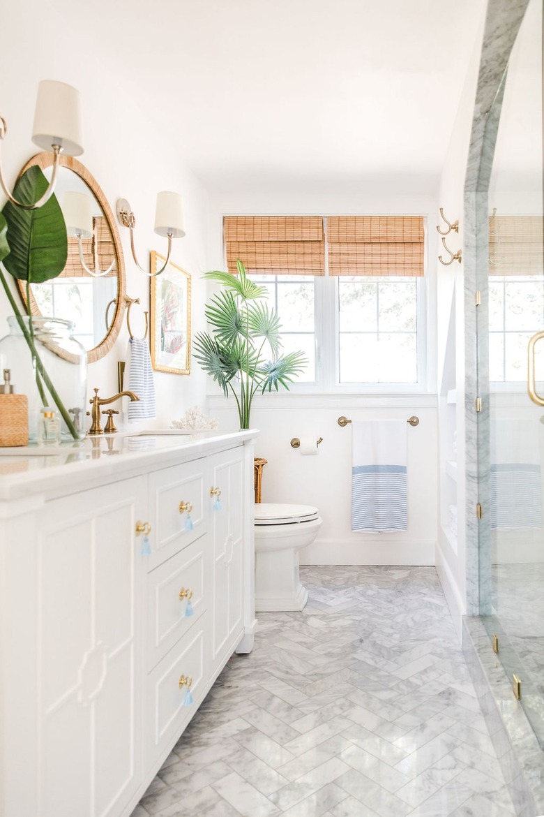 Bathroom with rattan detailing and frilly hardware