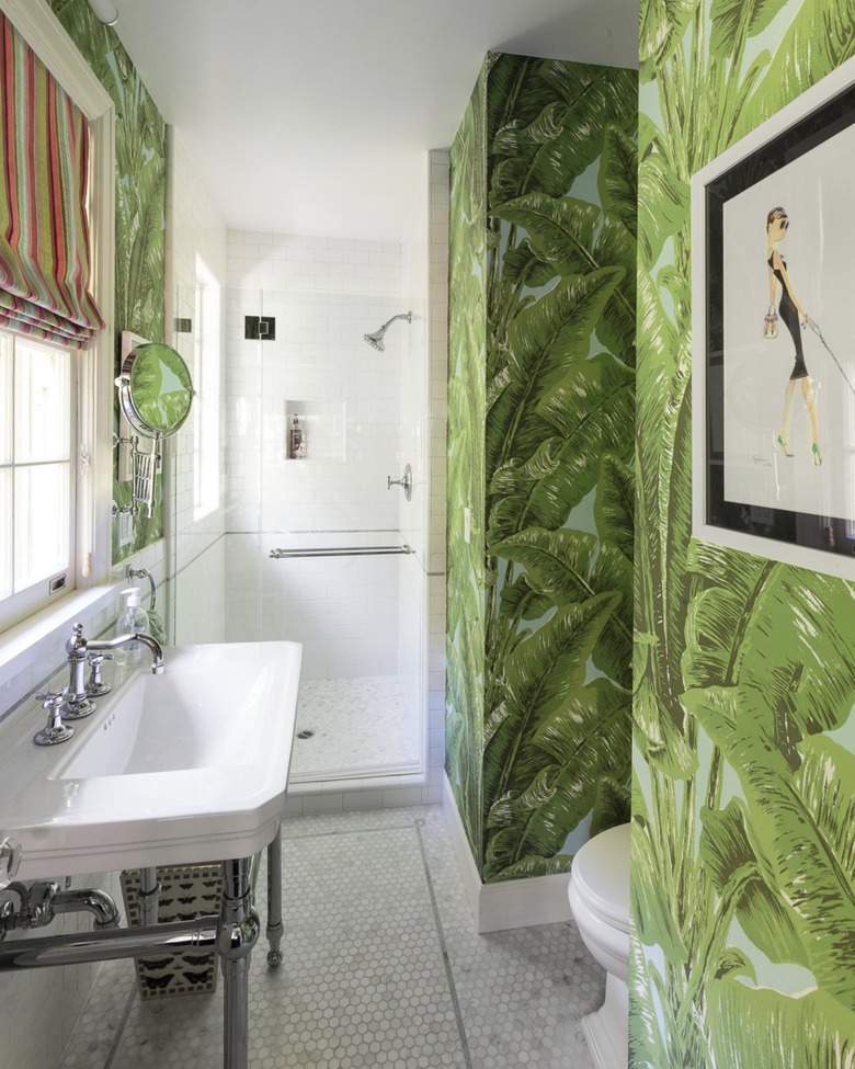 Beach bathroom with bright tropical wallpaper