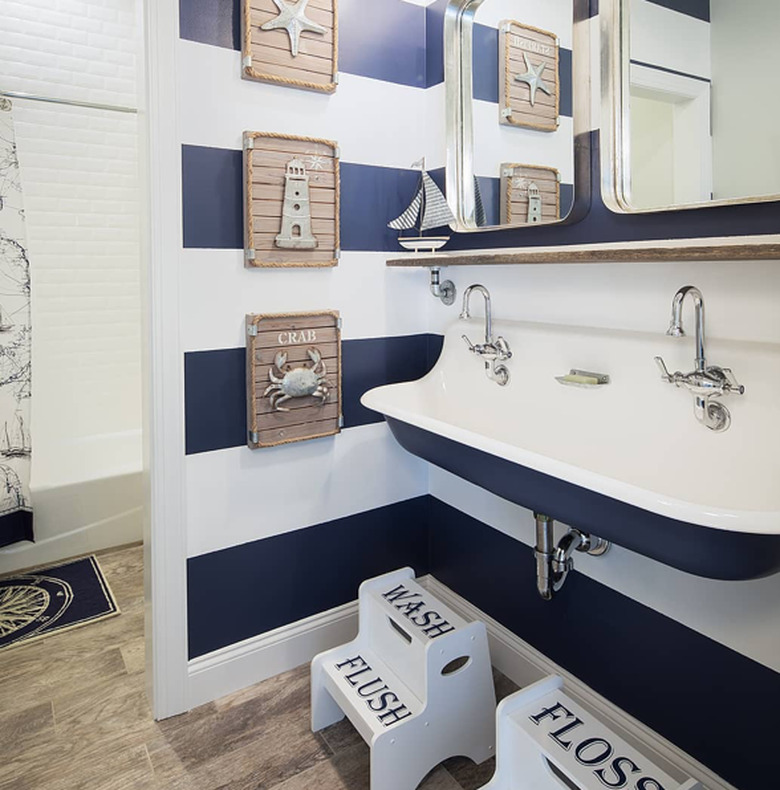 coastal bathroom with blue and white striped walls