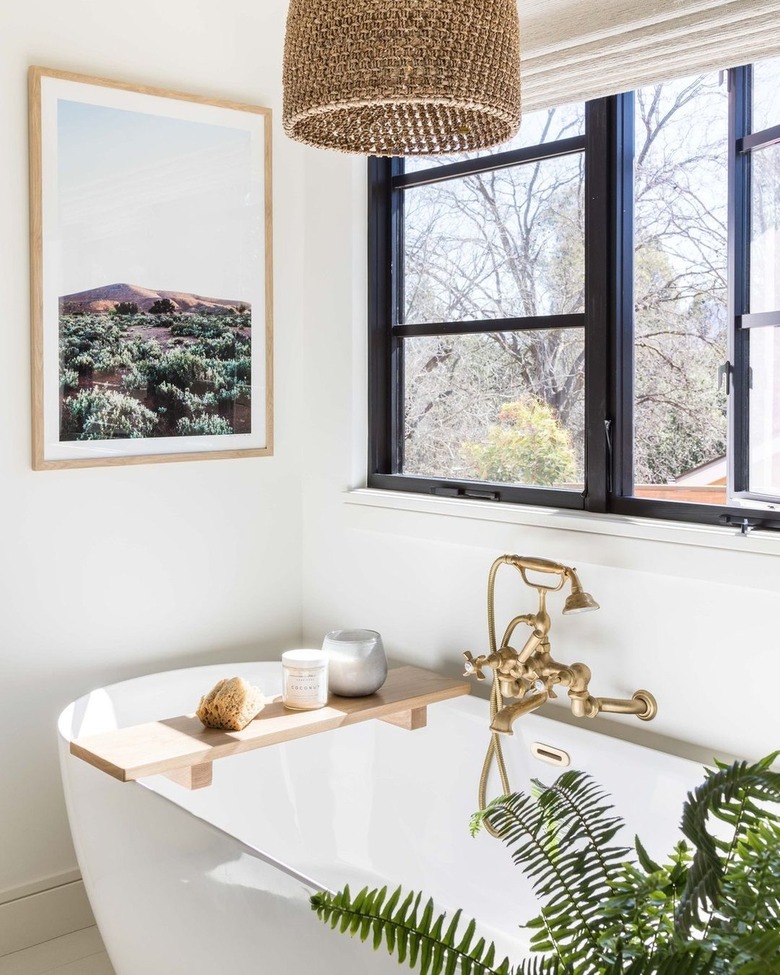 white bathroom with large freestanding tub