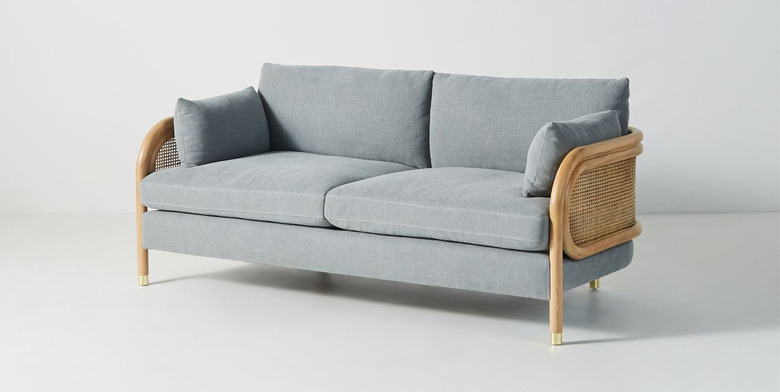 coastal sofa by Anthropologie with two seats and caned back