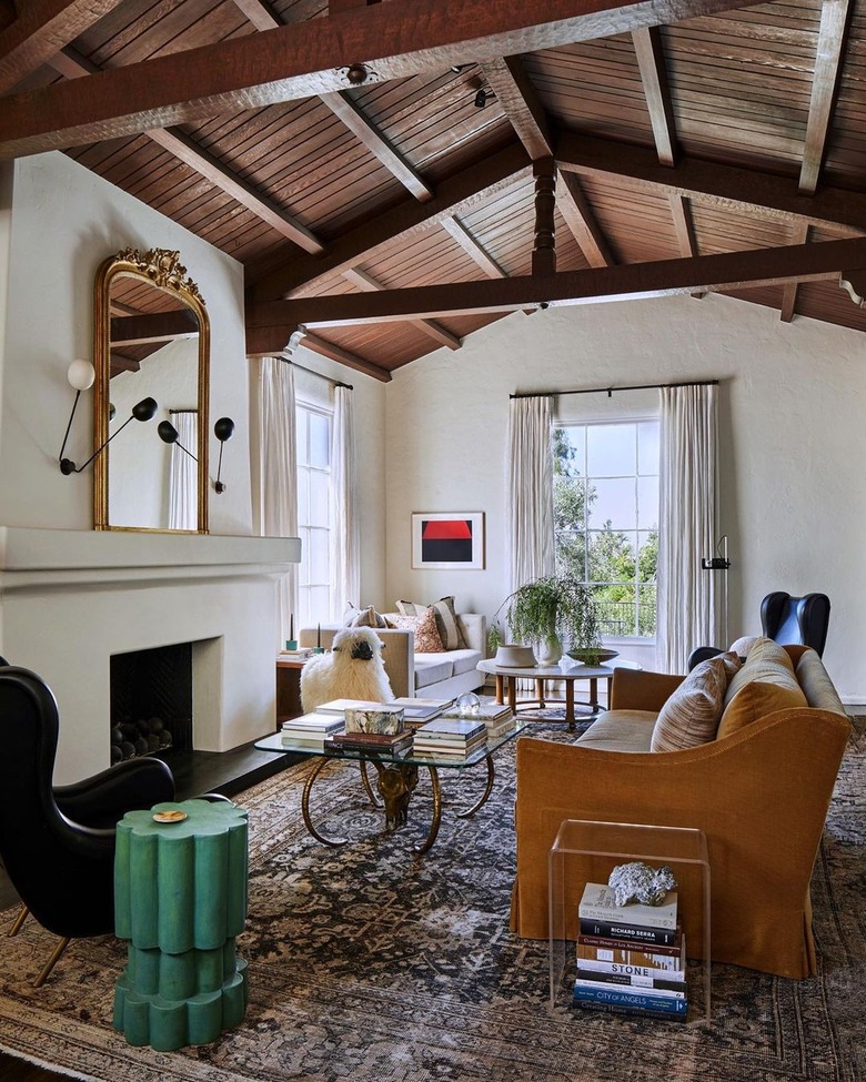 Vaulted eclectic living room with wood beams