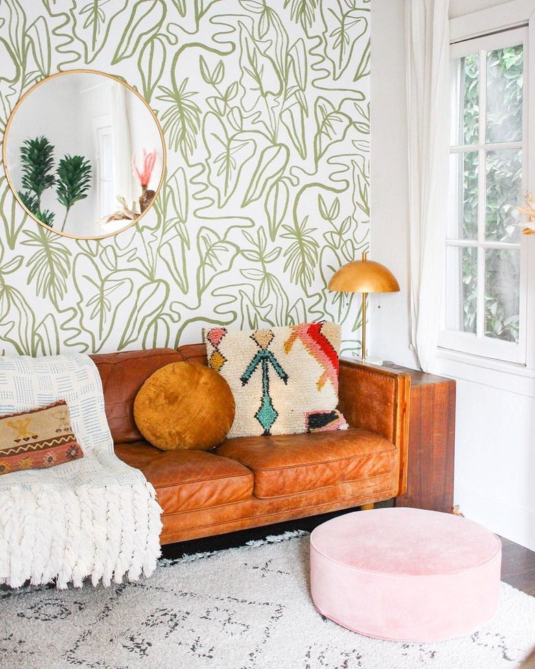 Airy living room with caramel leather sofa