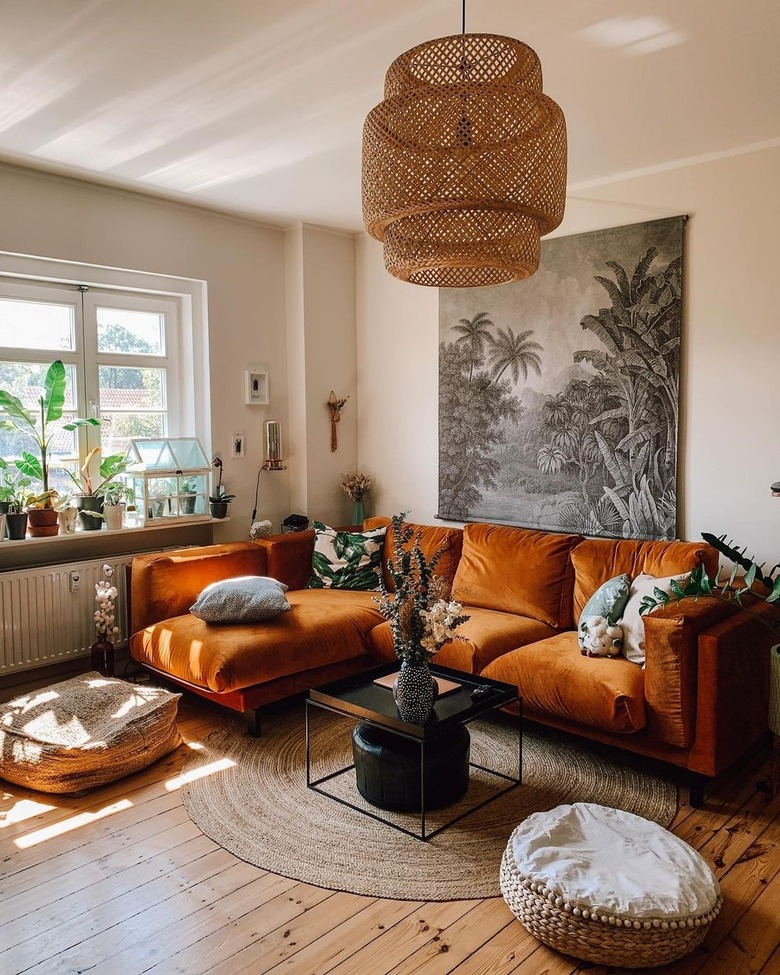 Boho living room with caramel velvet sofa