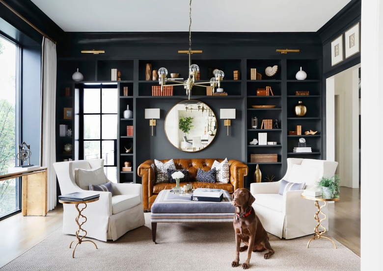 Formal living room with caramel chesterfield sofa