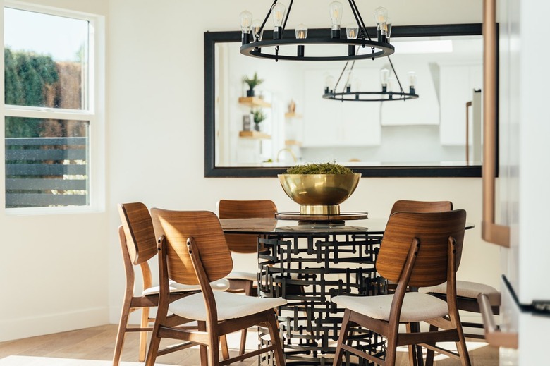 Dining room with wood modernist chairs