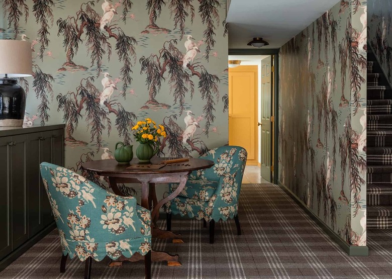 room with teal armchairs