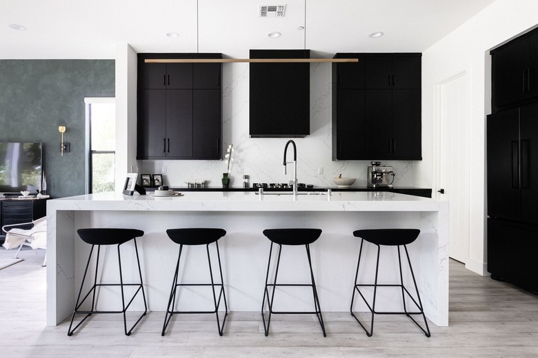 Modern kitchen with black cabinets