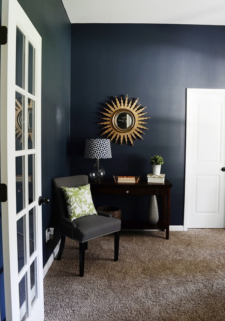 living room with navy walls