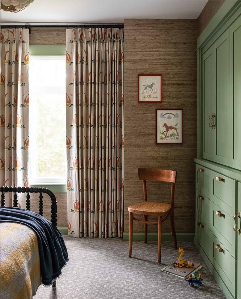 boys room with brown grasscloth walls and green storage