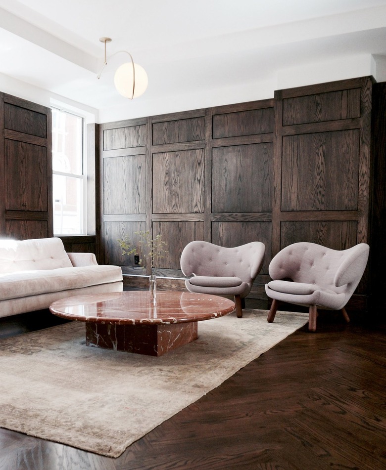 lilac lounge chairs in brown living room