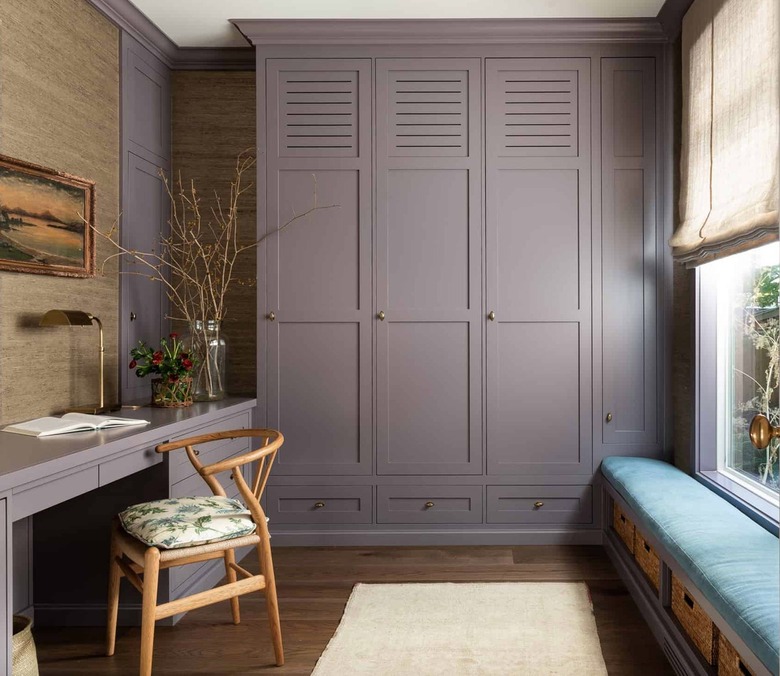 office with lavender built-in and blue bench cover