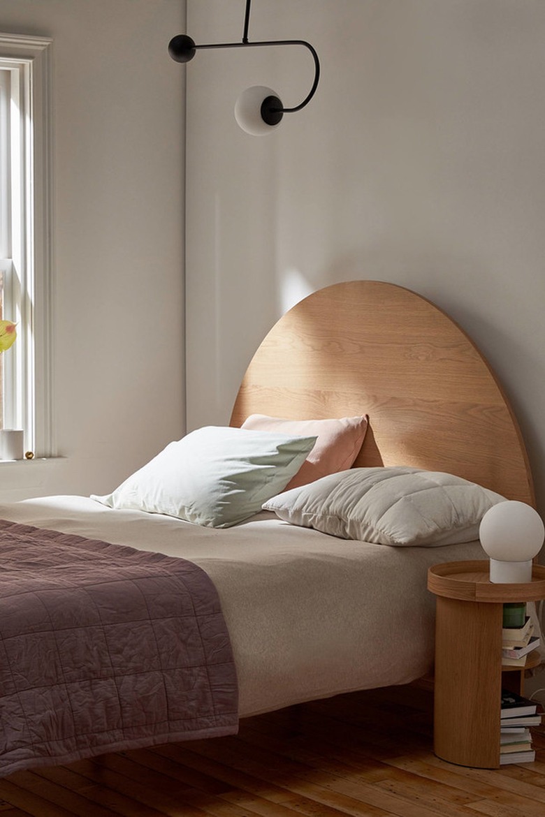 lavender and light wood bedroom