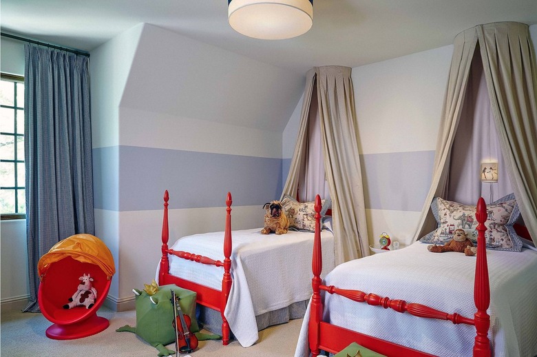 set of red beds against wall with purple band