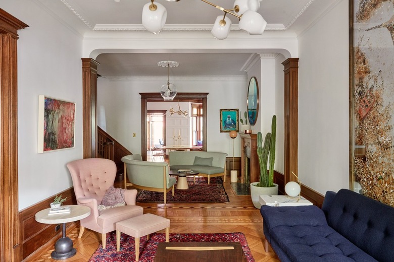 seating area in historic brownstone that features pink