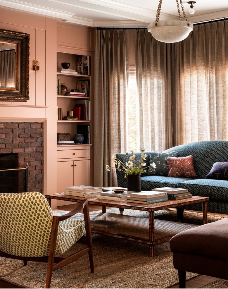 quiet living room with taupe drapes